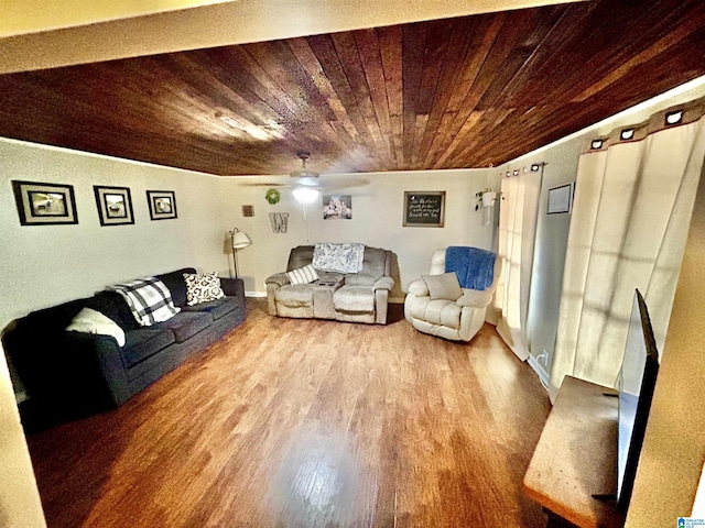 unfurnished living room with hardwood / wood-style flooring, ceiling fan, and wooden ceiling