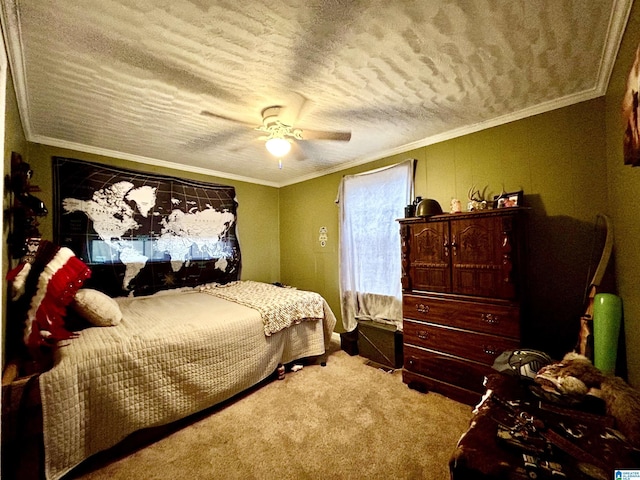 bedroom with a textured ceiling, light colored carpet, ceiling fan, and ornamental molding