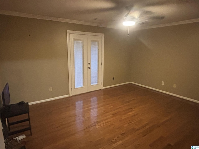 interior space featuring ceiling fan, french doors, dark wood-type flooring, and ornamental molding