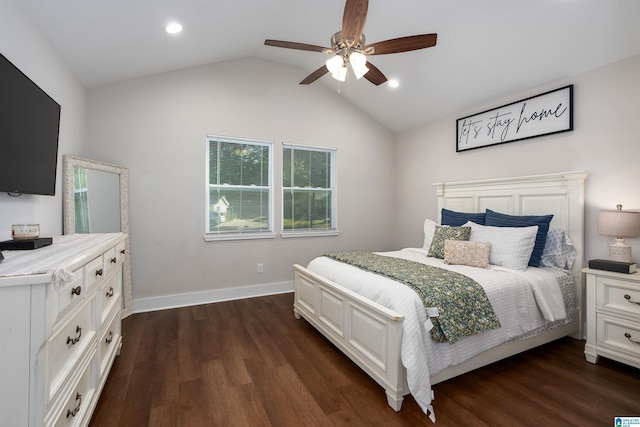 bedroom with ceiling fan, dark hardwood / wood-style flooring, and lofted ceiling