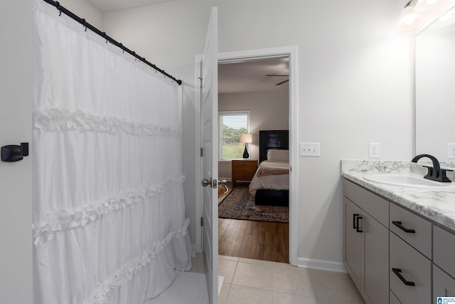 bathroom with vanity, tile patterned floors, and ceiling fan