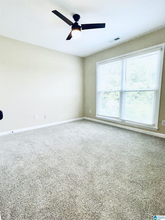 empty room featuring ceiling fan