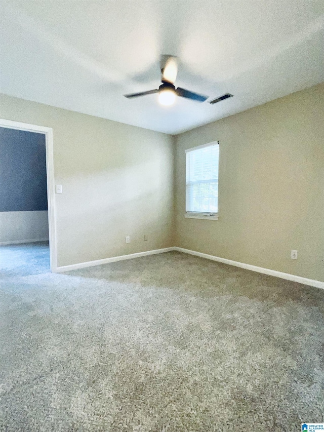 spare room featuring ceiling fan