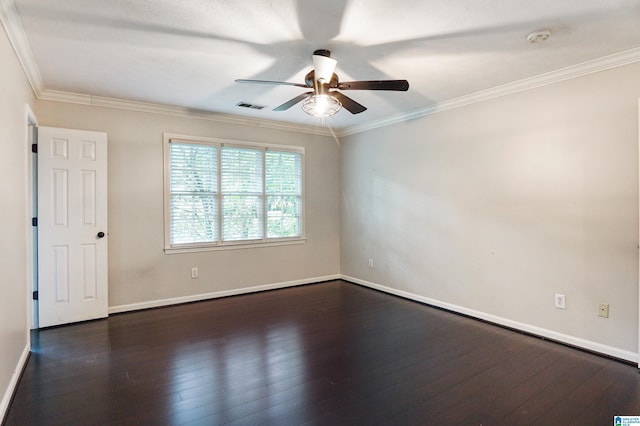 empty room featuring crown molding, dark hardwood / wood-style flooring, and ceiling fan