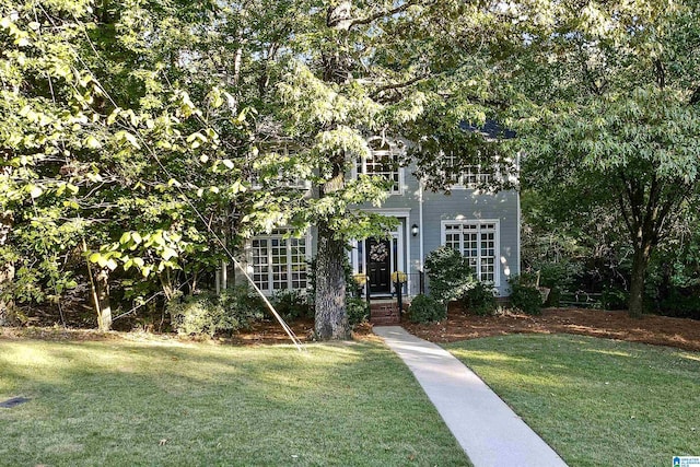 view of front of home with a front lawn