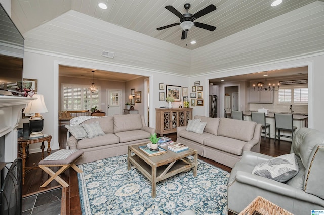 living room featuring ceiling fan with notable chandelier, dark hardwood / wood-style floors, lofted ceiling, and wood ceiling