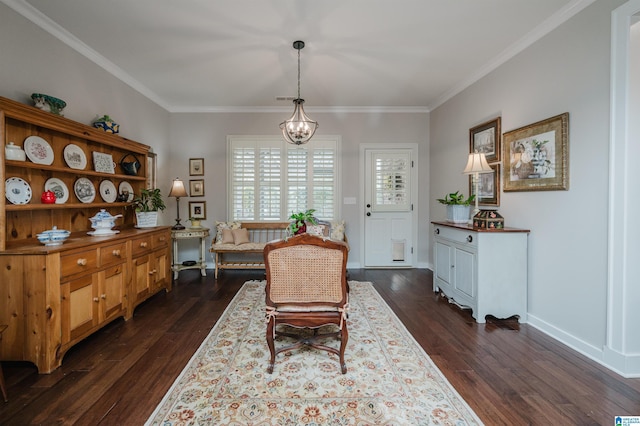 dining room with a notable chandelier, dark hardwood / wood-style floors, and ornamental molding