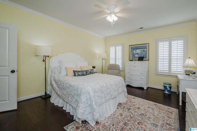 bedroom featuring multiple windows, ceiling fan, dark hardwood / wood-style floors, and ornamental molding