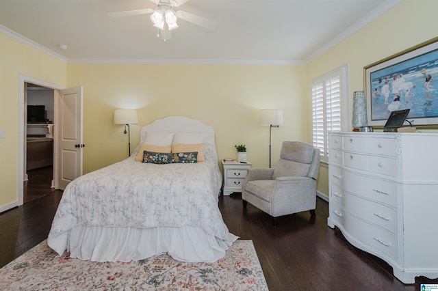 bedroom featuring ornamental molding, ceiling fan, and dark wood-type flooring