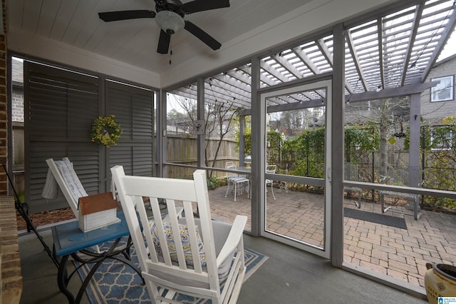 sunroom / solarium with ceiling fan