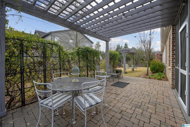 view of patio featuring a pergola