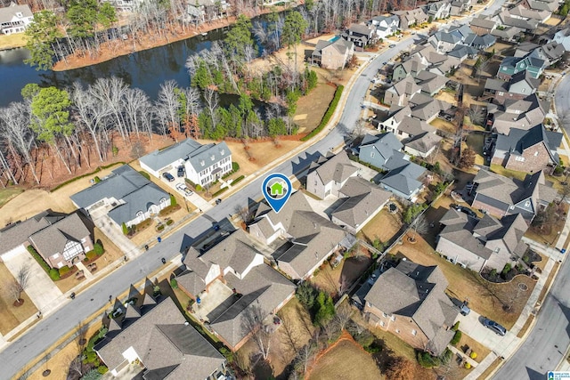 drone / aerial view featuring a water view