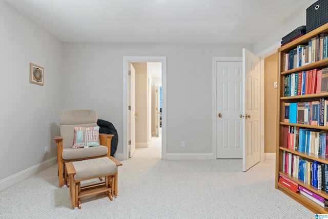 sitting room with light carpet