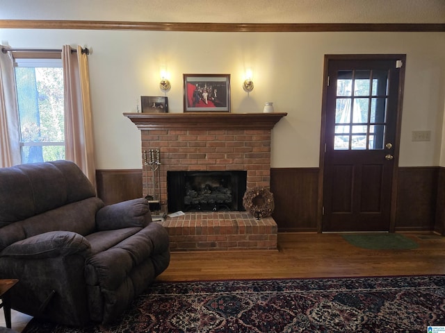 living room featuring a fireplace and hardwood / wood-style flooring