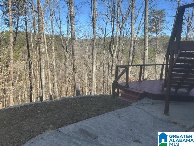 view of yard featuring a wooden deck