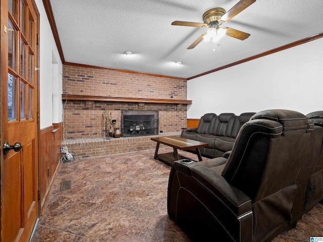 living room featuring wooden walls, crown molding, and a textured ceiling