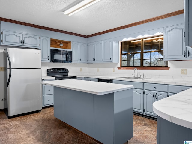 kitchen featuring black appliances, a kitchen island, sink, and a textured ceiling