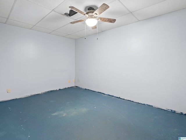 empty room featuring ceiling fan and concrete flooring