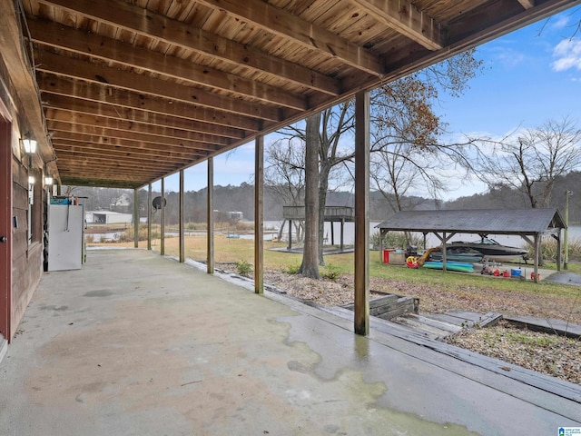 view of patio / terrace featuring a carport