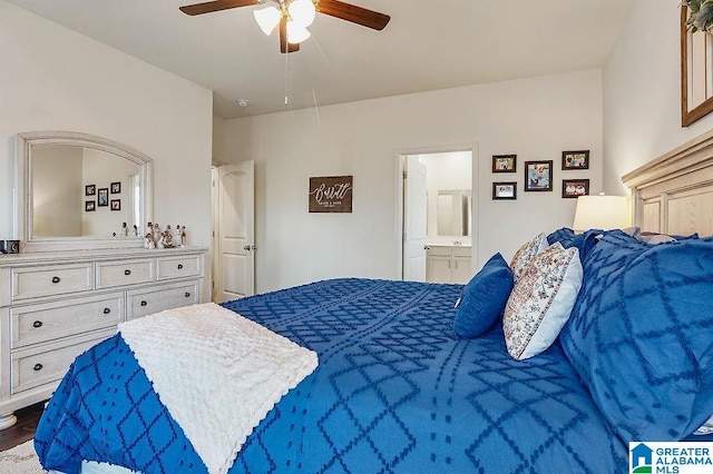 bedroom with hardwood / wood-style flooring, ceiling fan, and connected bathroom