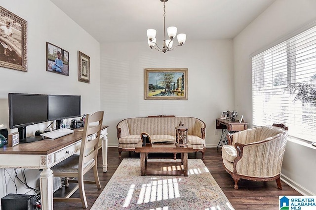 office with a notable chandelier and dark hardwood / wood-style flooring