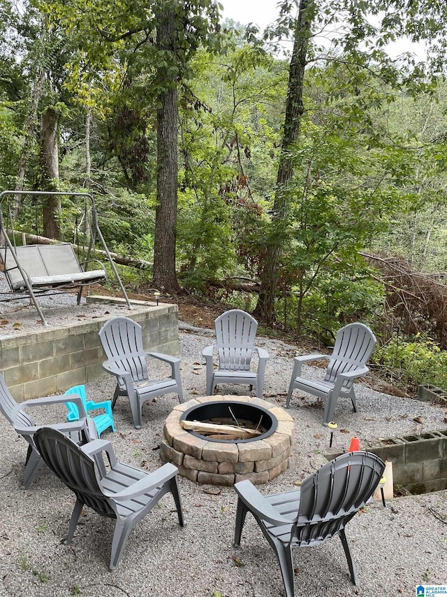 view of patio featuring an outdoor fire pit