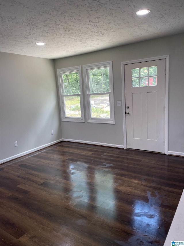 entrance foyer featuring a textured ceiling