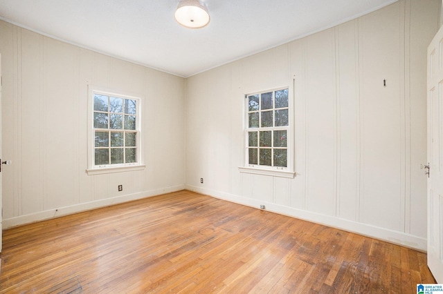 empty room featuring hardwood / wood-style flooring