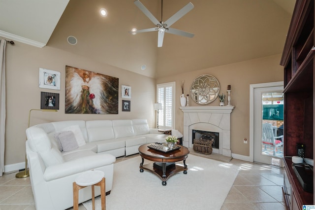 tiled living room with high vaulted ceiling and ceiling fan