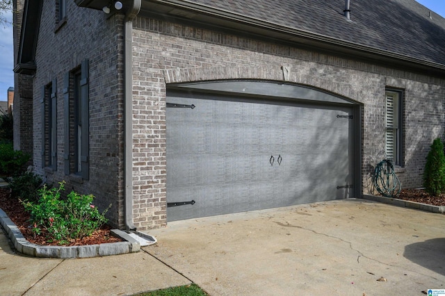 property entrance with a garage