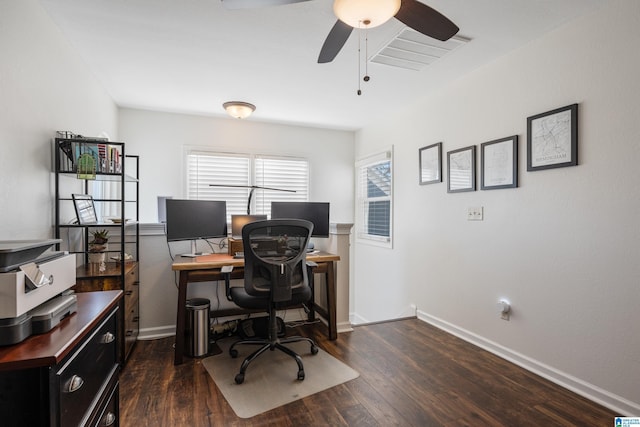 office area with ceiling fan and dark hardwood / wood-style floors