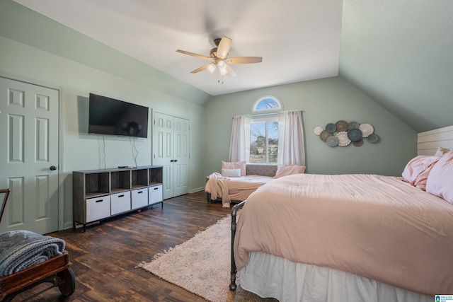 bedroom featuring dark wood-type flooring, ceiling fan, and lofted ceiling