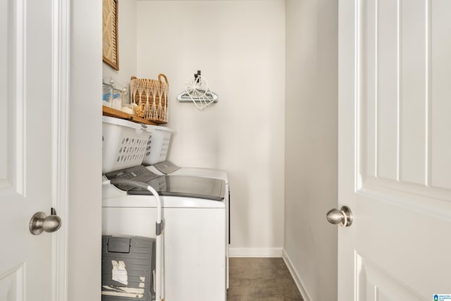 clothes washing area featuring separate washer and dryer