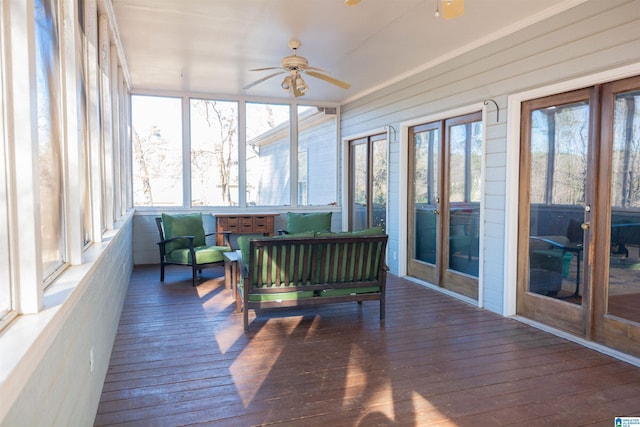 sunroom / solarium with ceiling fan and plenty of natural light