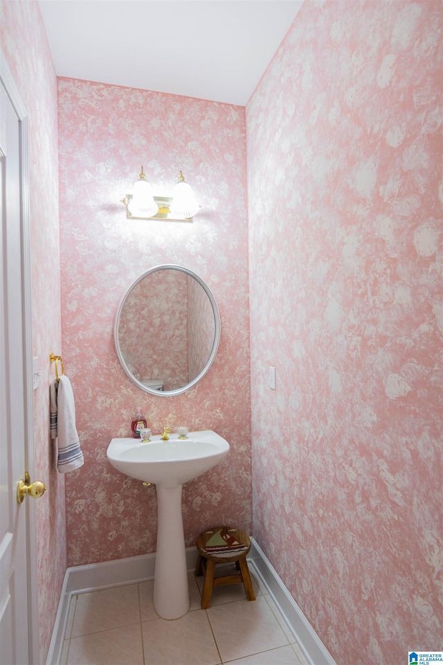 bathroom featuring tile patterned floors and sink