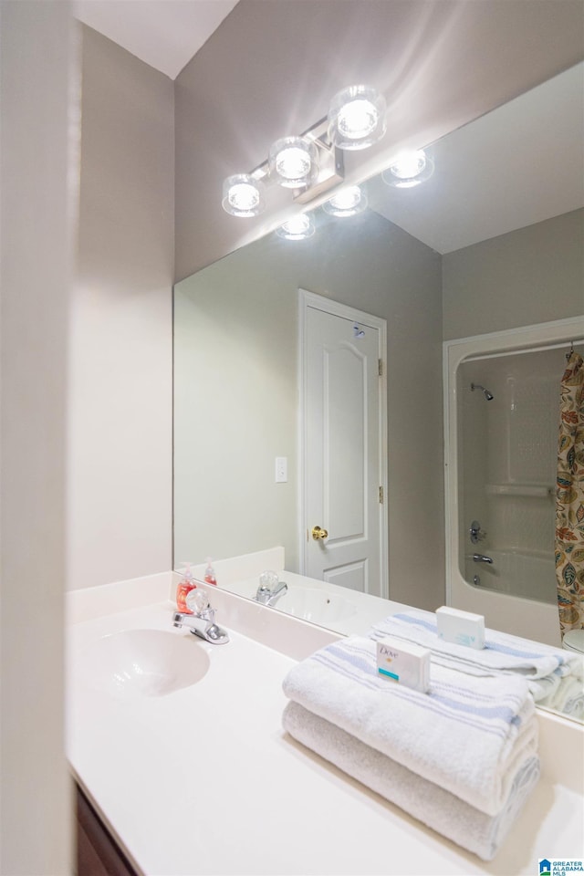 bathroom with vanity and shower / bathing tub combination