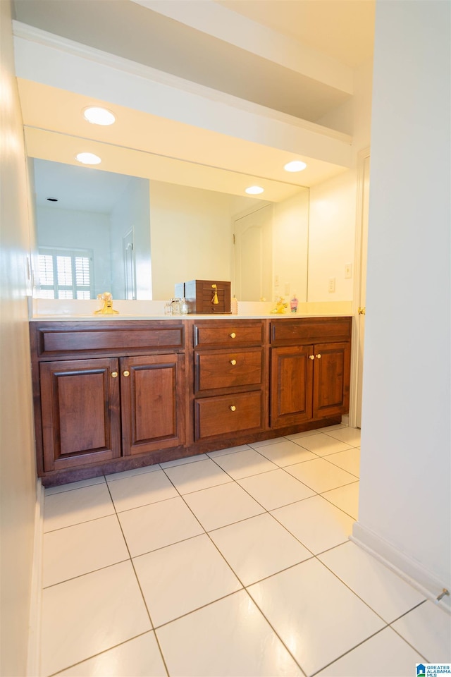 bathroom featuring tile patterned floors and vanity