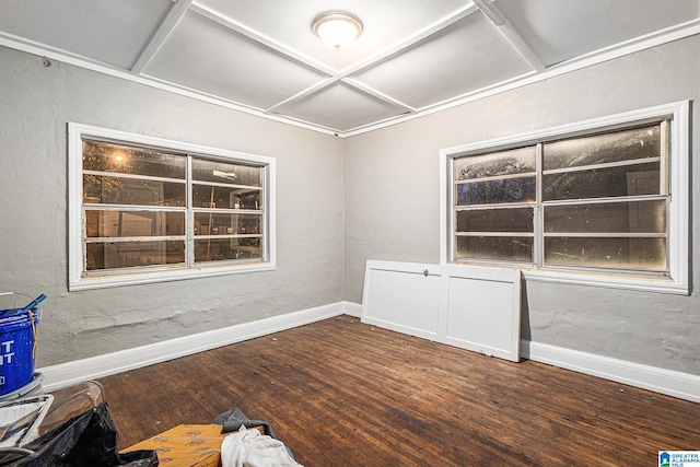 unfurnished room featuring hardwood / wood-style floors and coffered ceiling