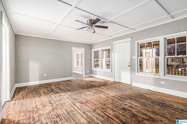 unfurnished sunroom featuring ceiling fan and coffered ceiling