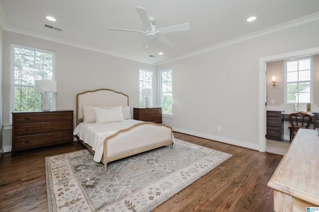 bedroom with multiple windows, ceiling fan, dark wood-type flooring, and ornamental molding