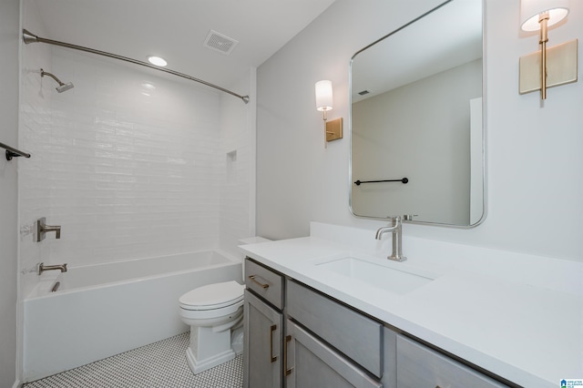 full bathroom featuring bathtub / shower combination, tile patterned floors, vanity, and toilet