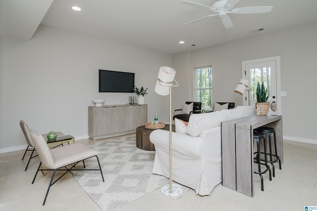 living room with ceiling fan