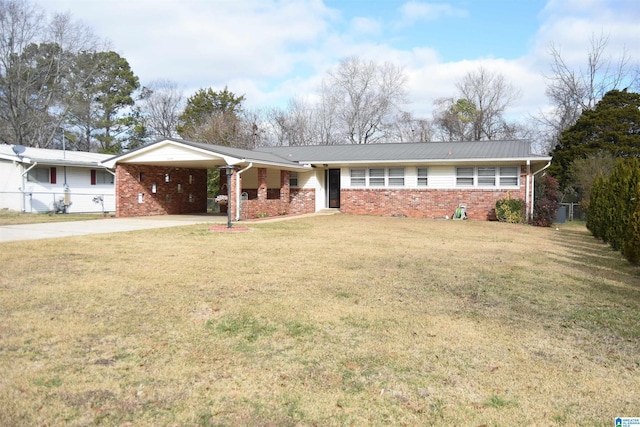 ranch-style home with a front lawn and a carport