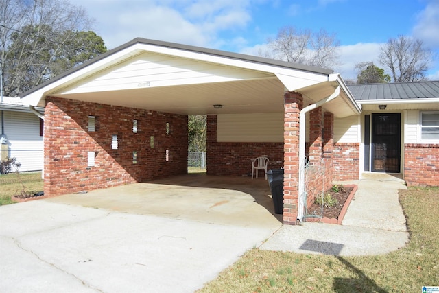 exterior space with a carport