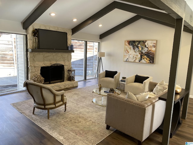 living room with a stone fireplace, lofted ceiling with beams, and dark wood-type flooring