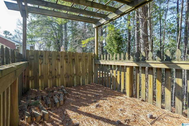 wooden deck featuring a pergola