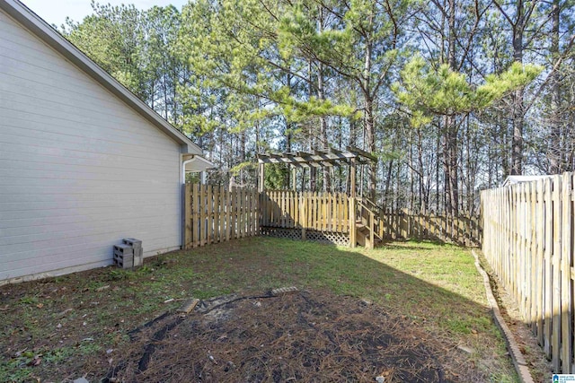 view of yard with a wooden deck