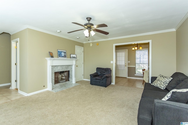 living room featuring carpet floors, crown molding, and a premium fireplace