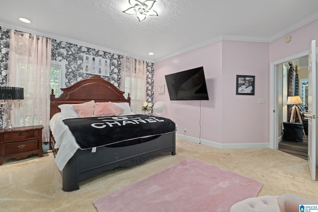 bedroom with a textured ceiling, light colored carpet, and crown molding