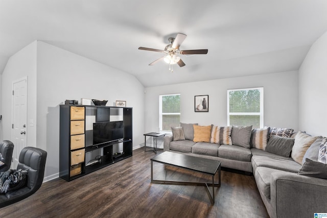 living room with ceiling fan, dark wood-type flooring, and vaulted ceiling